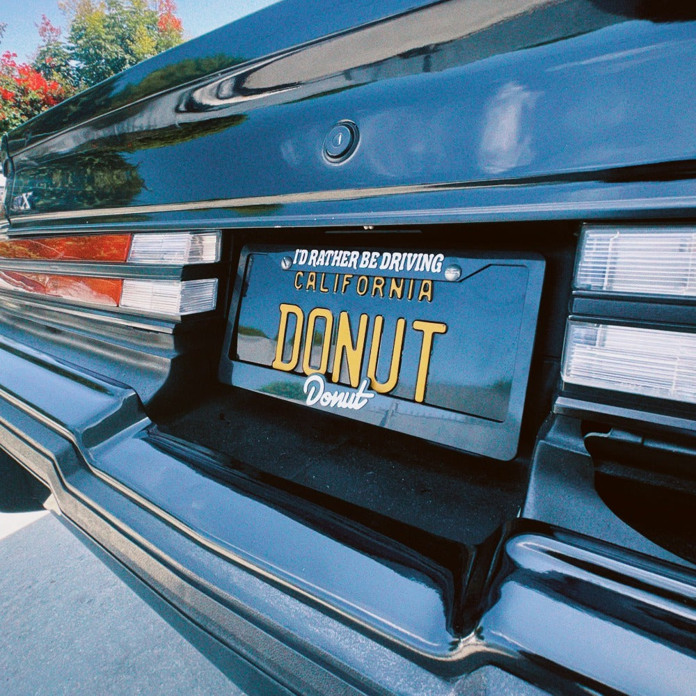 I d Rather Be Driving License Plate Frame Donut Media Store